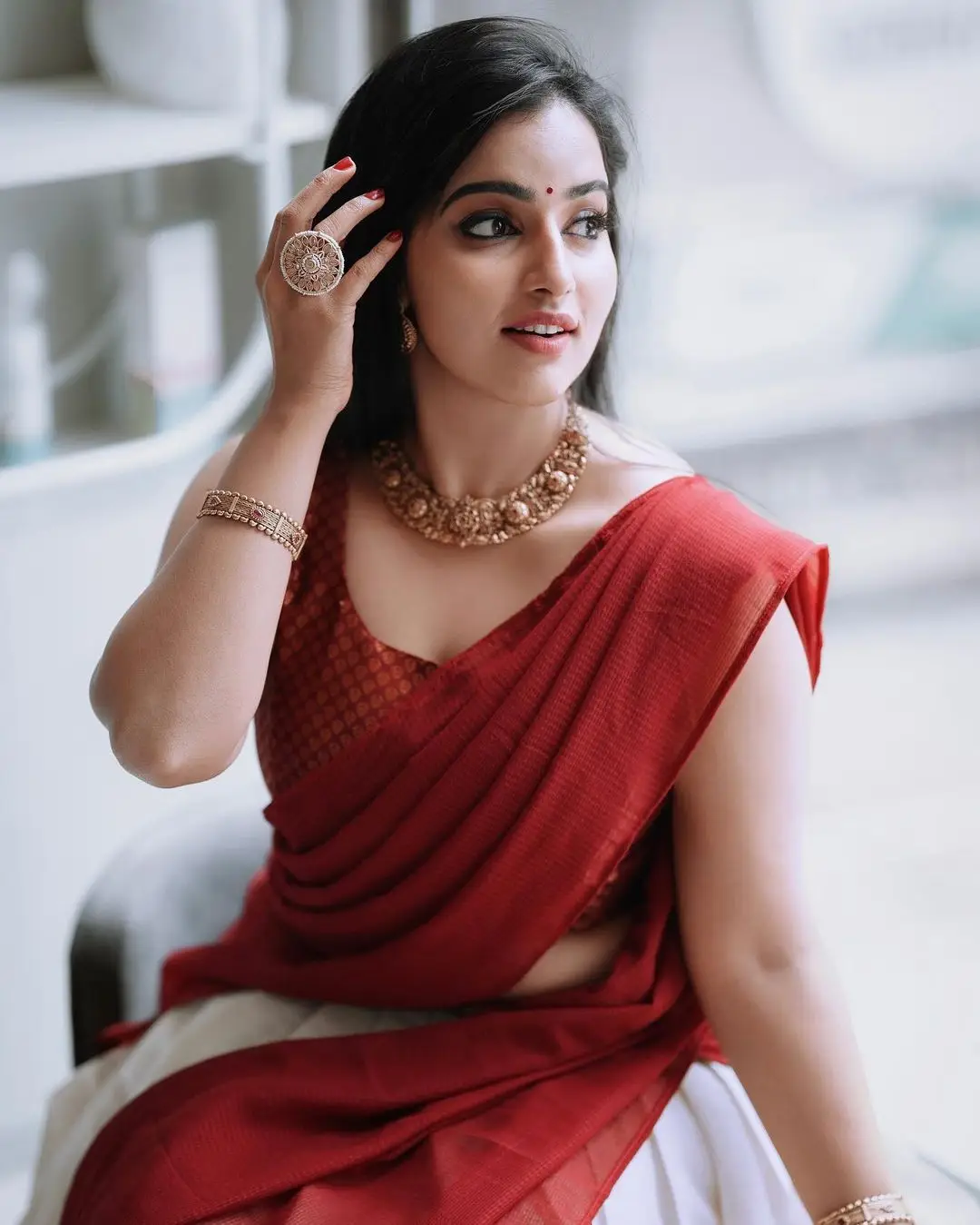 Malavika Menon In South Indian Traditional Red Half Saree Voni Blouse